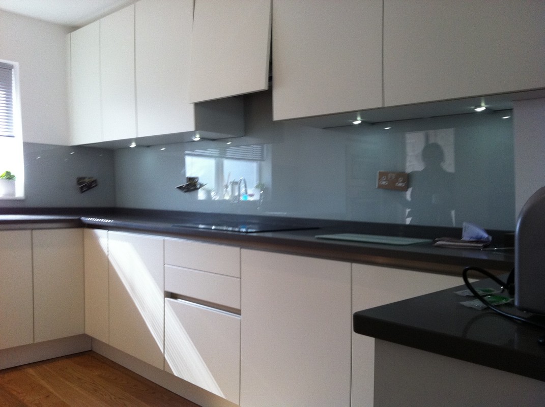 Grey glass kitchen splashback with LED lighting in Blackheath
