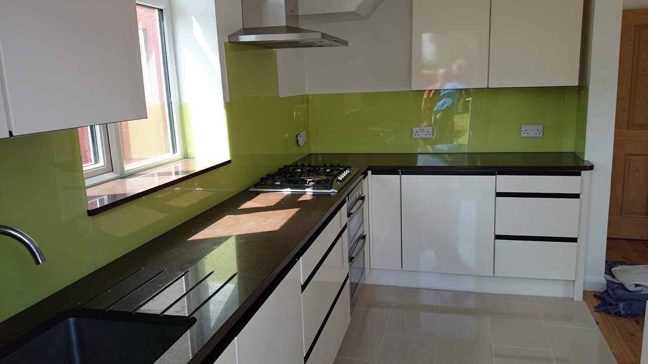 Lime green glass kitchen splashback installed by Blackheath glaziers