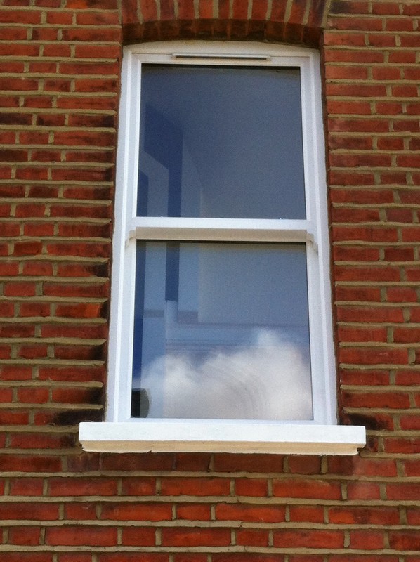 uPVC sash window on Victorian red brick house in Blackheath